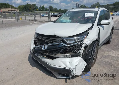 2020 Honda Cr-V 2Wd Touring from USA, damaged, VIN 2HKRW1H97LH409358